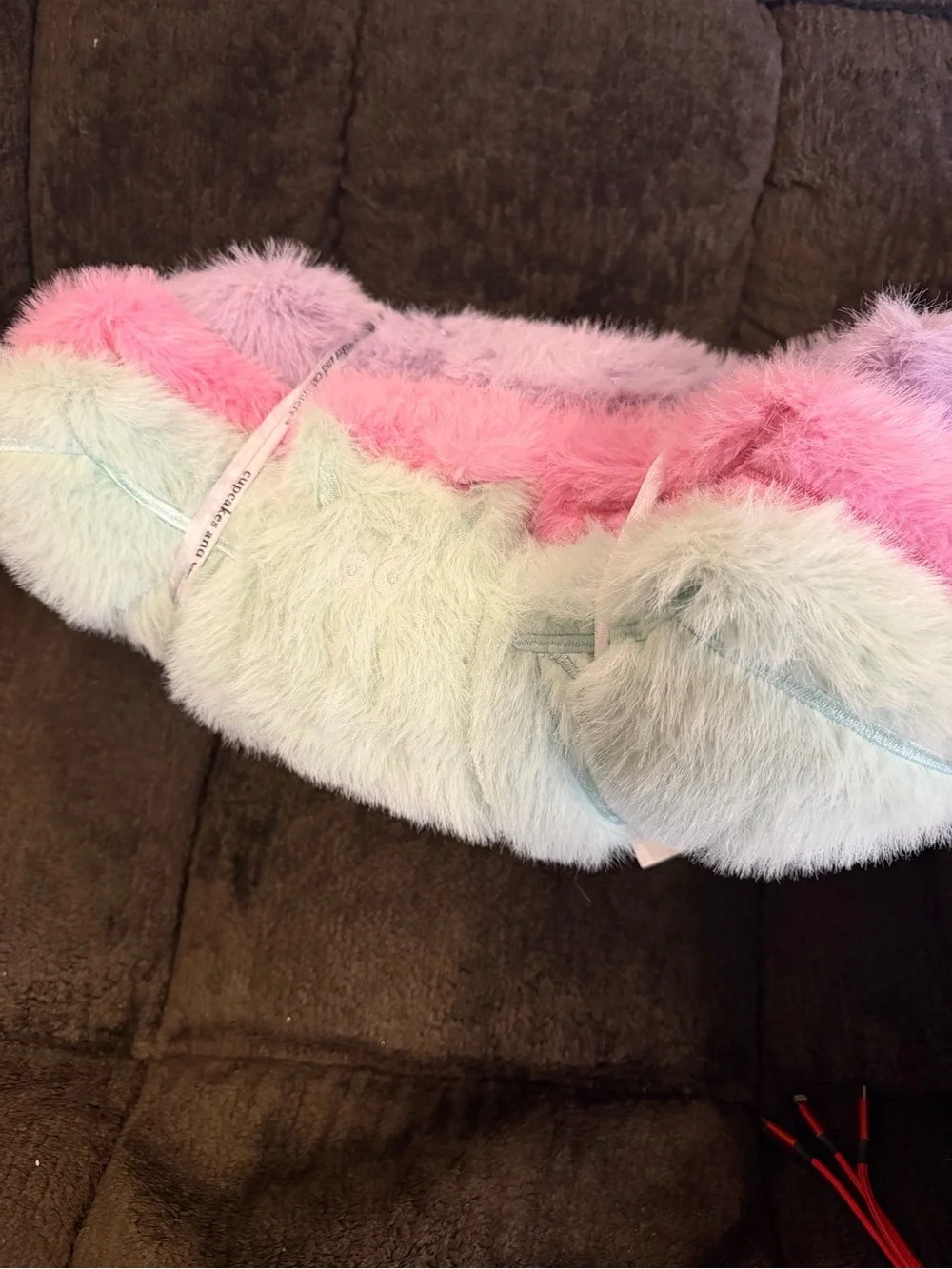 cupcakes & cashmere Pastel Fuzzy bat pillows in Pink, Lavender & Mint